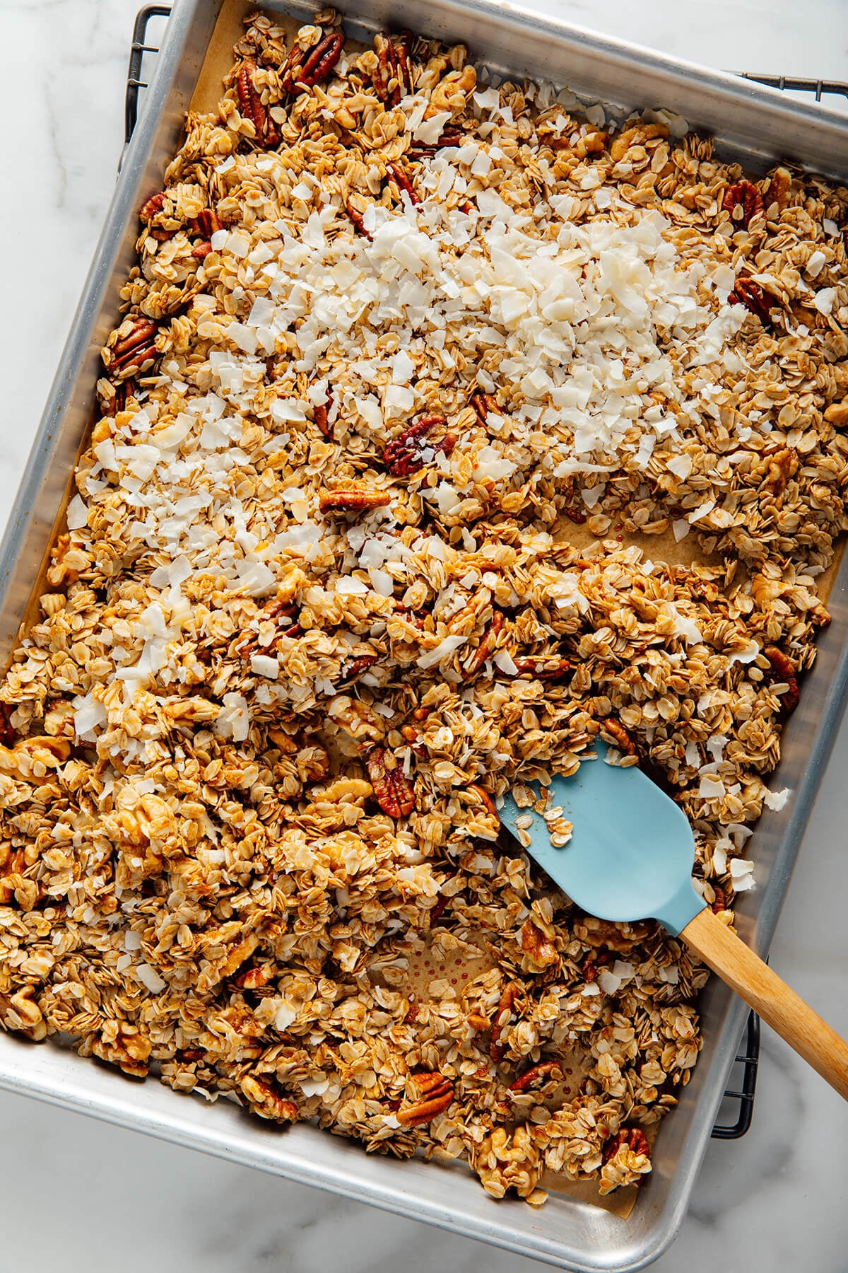 adding coconut to granola
