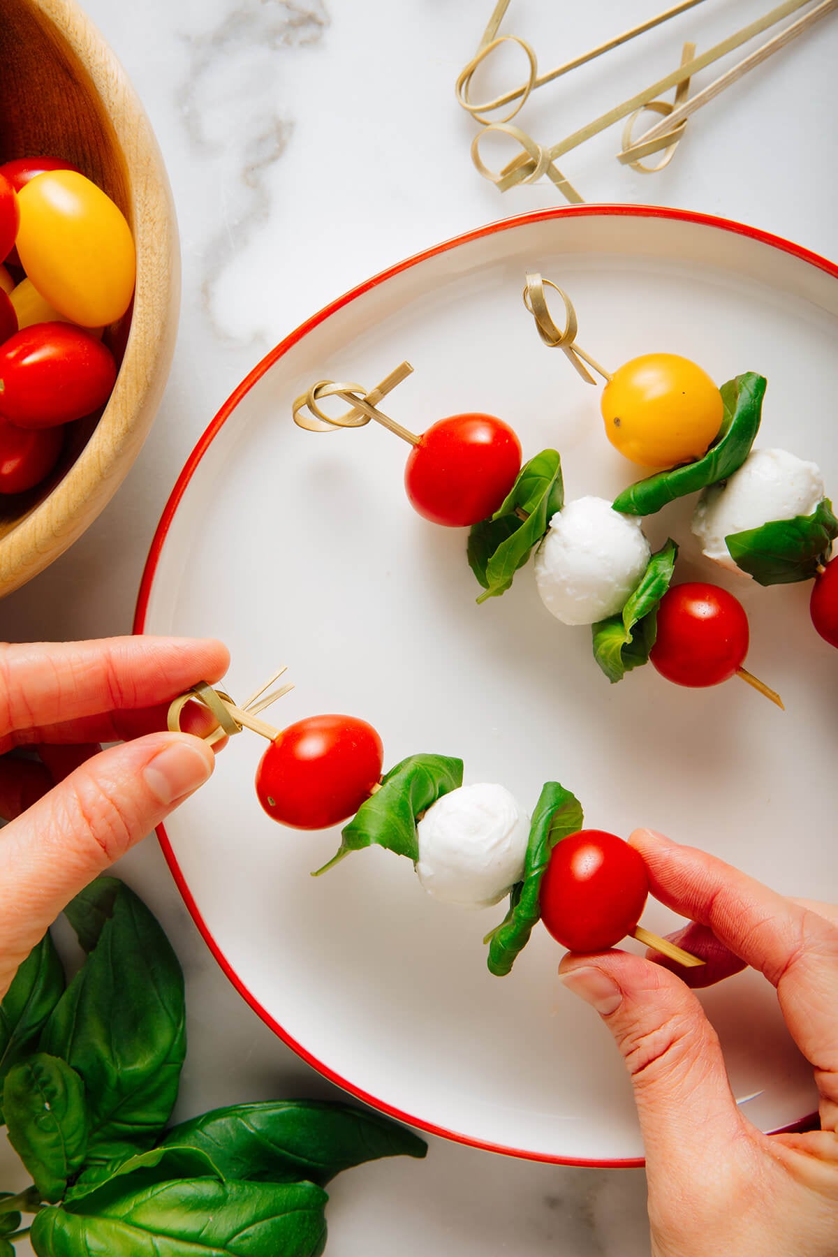 skewers of tomato, mozzarella and basil