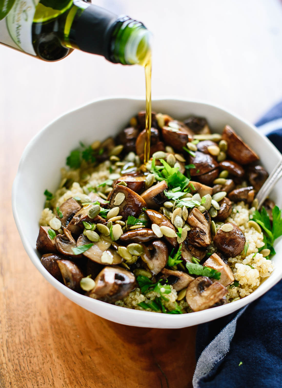 Roasted mushrooms on herbed quinoa with olive oil and pepitas