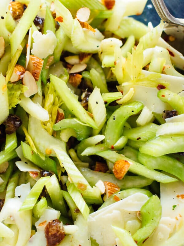 This celery salad recipe will surprise you! Crisp celery, toasted almonds, sweet dates and Parmesan combine to create a delicious, crisp, fresh salad. cookieandkate.com