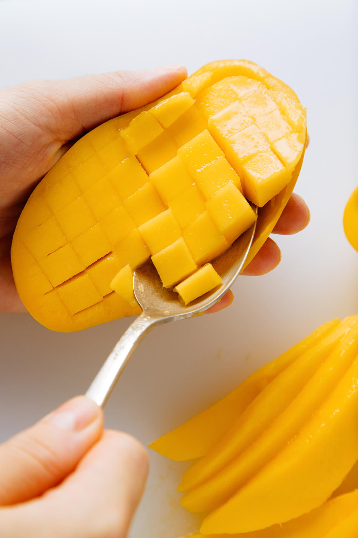 how to scoop out diced mango